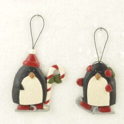 158-51617 Ornament-S/2 PENGUINS W/CANDY CANE/EARMUFFS