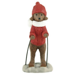 238-13831 SKIING DOG W/RED SWEATER